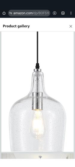 Beautiful Seeded Glass Pendant Light Fixture with modern brushed chrome finish .
