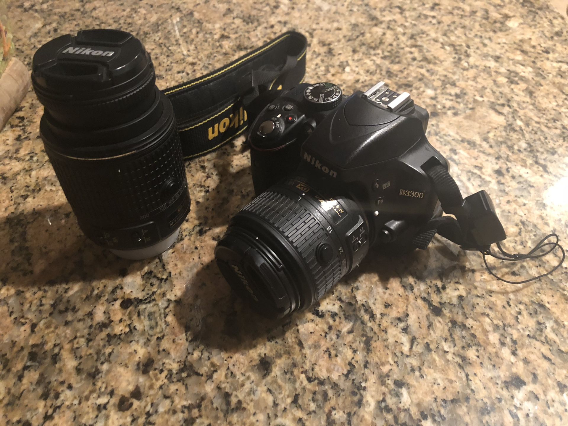 Nikon D3300 with 2 Nikor lenses