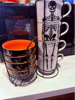 Skeleton Halloween bowls and mugs set both never used but mugs ceramic still have plastic on