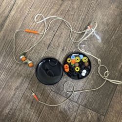 Skull Candy Headphones With A Ton Of Replacement Ear Buds and storage container