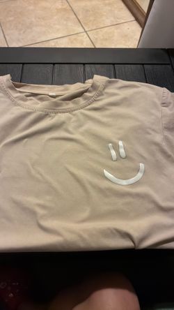 Beige Smiley face t-shirt, size small