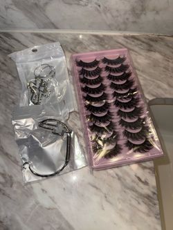eyelashes Women perfume oil and eye eyelashes, also eye rings and bracelets