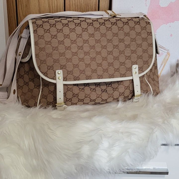 Gucci Diaper Bag - baby & kid stuff - by owner - household sale