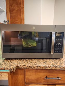 GE 1.9  CU .FT. Over -The-Range Sensor Microwave Oven