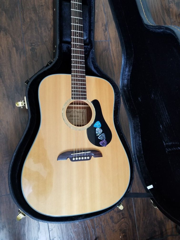 Alvarez Acoustic Guitar ( with case and picks)
