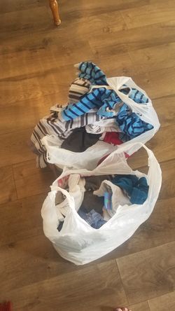 6 months to 1 year boy clothes and 2 boxes of size 2 diapers
