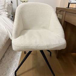 Spinning White Chair
