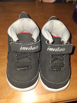 Grey And Black Size 4C Jordan's 
