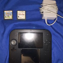 Nintendo 2DS/ Charger/ Mario Kart And Super Mario Bros.