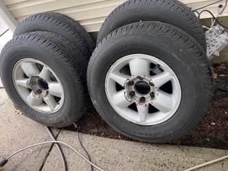 255/ 65 R16”Nissan Tires On 6 Lug Rims.