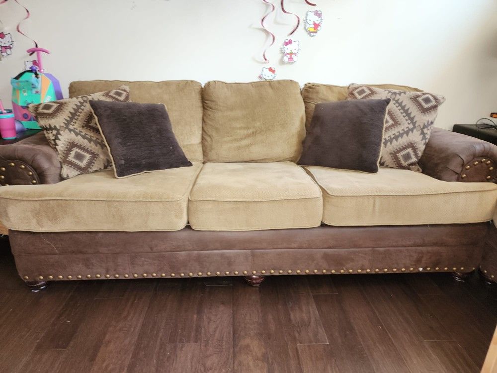 Couch For Sale (3 seater And A 2 Seater) With Cushions.. Brown And Beige Color