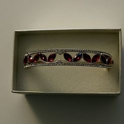 Anne Klein red crystal hinged bangle bracelet with marquis rhinestone accents