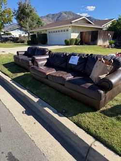 Brown sofa/loveseat