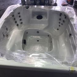 Hot tub spa. Still in wrapper. 7-8 seats, mood light, 10 yr warranty