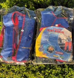 Two Inflatable Stearns life jackets
