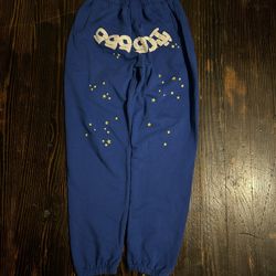 Blue and yellow SP5der sweatpants #sweatpants
