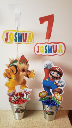 Mario Brothers centerpieces and cake topper. Ask for prices.
