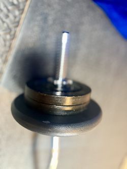 Standard Steel Curl Bar with Cast Iron Weight Plates pairs: 15#, & 4X 5 #. Total: 66 pounds