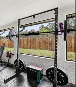 Power weight rack with Olympic bar and weights