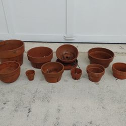 Preowned bunch of clay flower pots for orchids