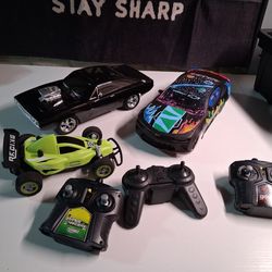 Three remote control cars.