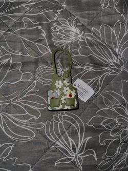 Garden apron hand sanitizer holder