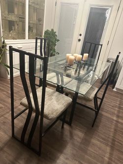 Glass dining table with 4 chairs