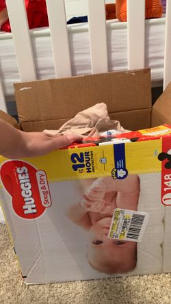 Box of baby boy clothes