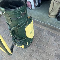 Tommy Bahamas golf staff bag with club dividers and shoulder strap . 