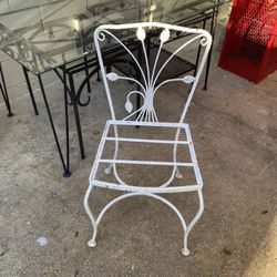 3 Iron Chairs .