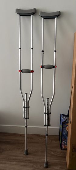 Adjustable adult crutches
