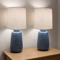two blue beach lamps