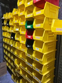 Plastic storage bins and shelves