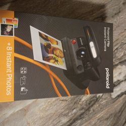 Camera With Instant Photos