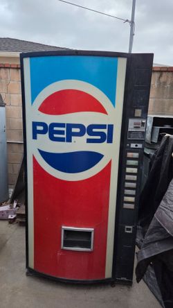 70s-80s vintage Pepsi soda machine.