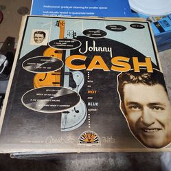 Johnny Cash with his hot and blue guitar