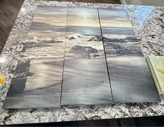 Three large beach canvas photos