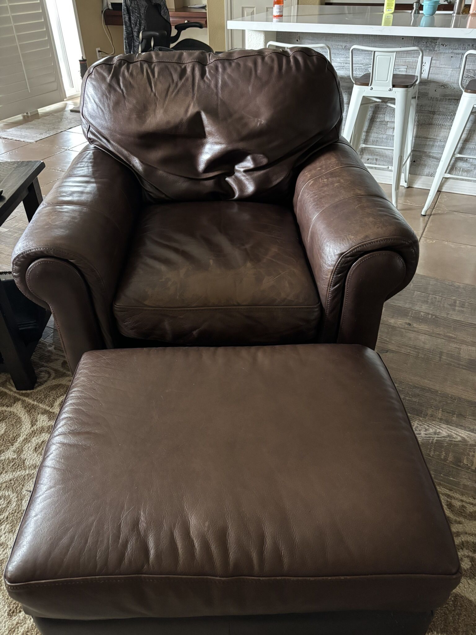 Brown Leather Chair And Ottoman