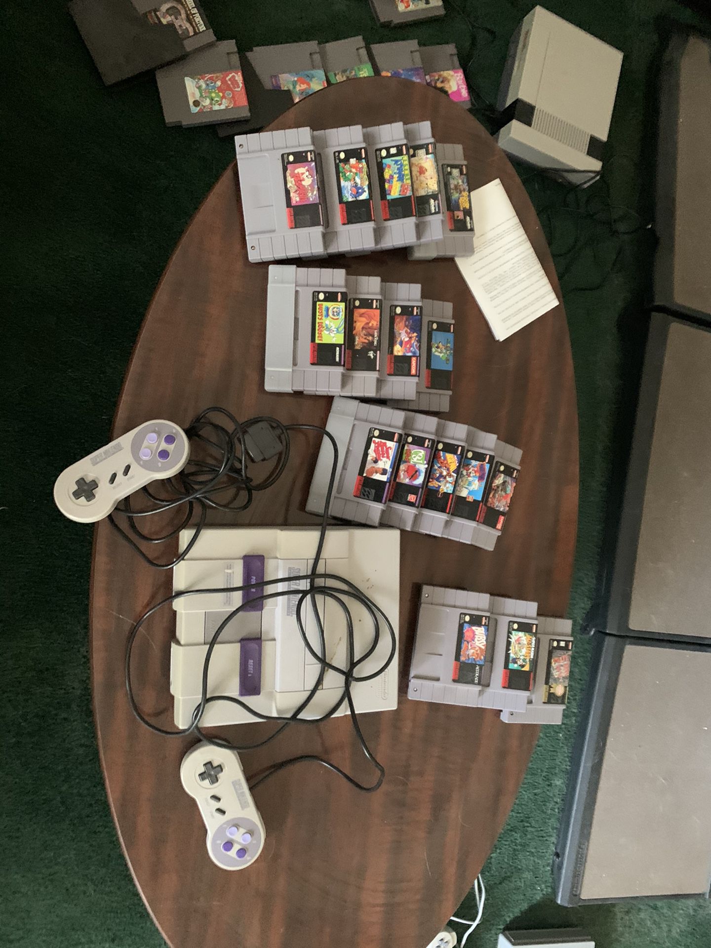 Super Nintendo and about 25 games