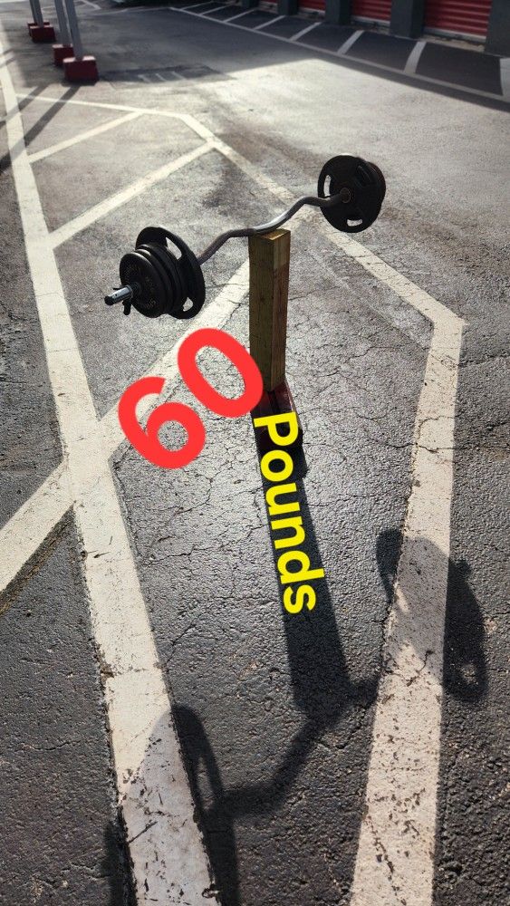 $100 Used Weight Plates 100POUNDS + used Curl Bar. Delivery fee