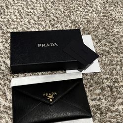 BRAND NEW AUTHENTIC PRADA CLUTCH WITH RECEIPT AND ALL PACKAGING
