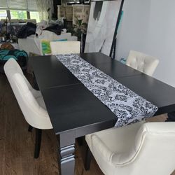 Black Table And 4 CREAM CHAIRS