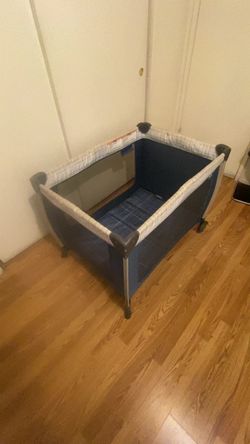Playpen bassinet changing table combo