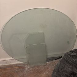 Large oval glass top for sale — approximately 46" x 60".