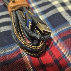 braided USB-A to Lightning cable for charging and syncing iPhones.