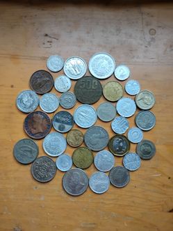 35 international coins . . DOUBLE your INVESTMENT