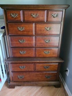 2 solid wood matching dressers.
