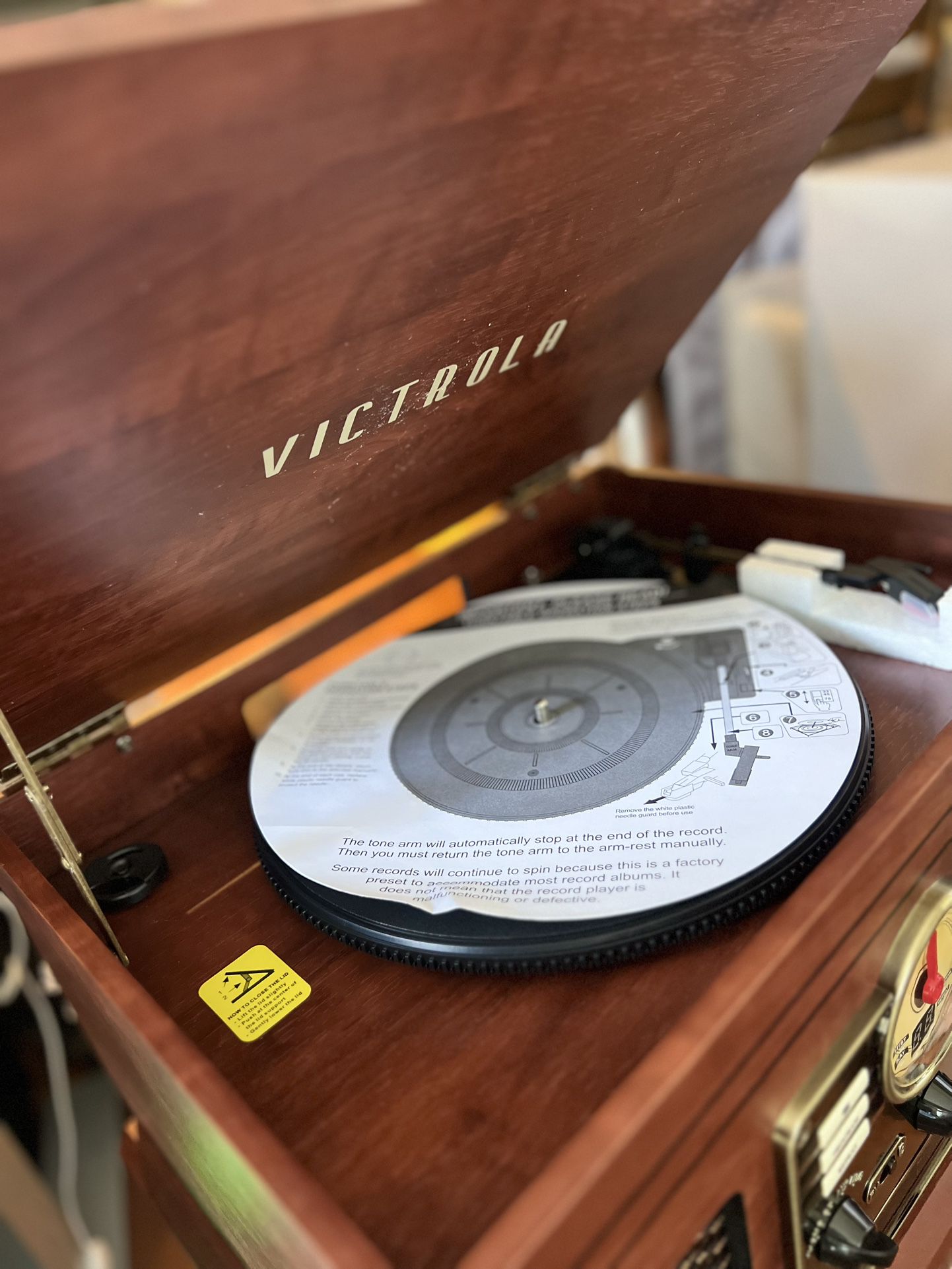 The Victrola 6-in-1 Nostalgic Record Player packs awesome features into a classic package