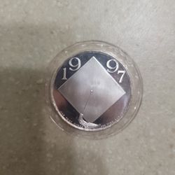 1997 Graduation Theme 1 Oz 999 Silver Coin.  Sealed