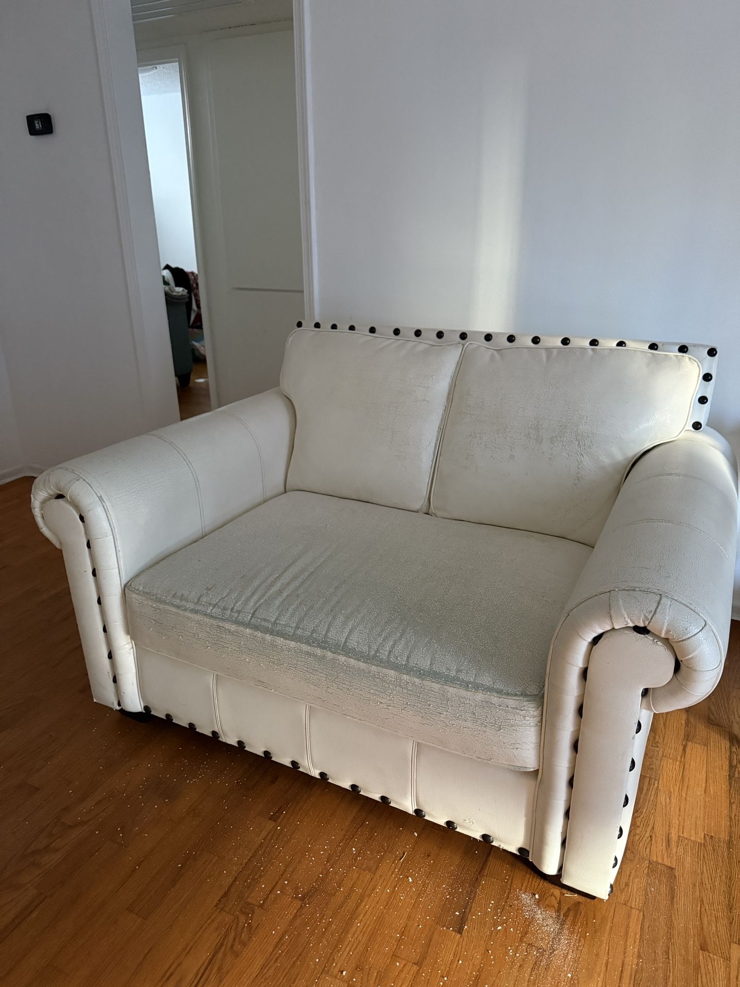 free cream white loveseat needs reupholstering